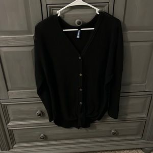 Woman’s black long sleeve tunic